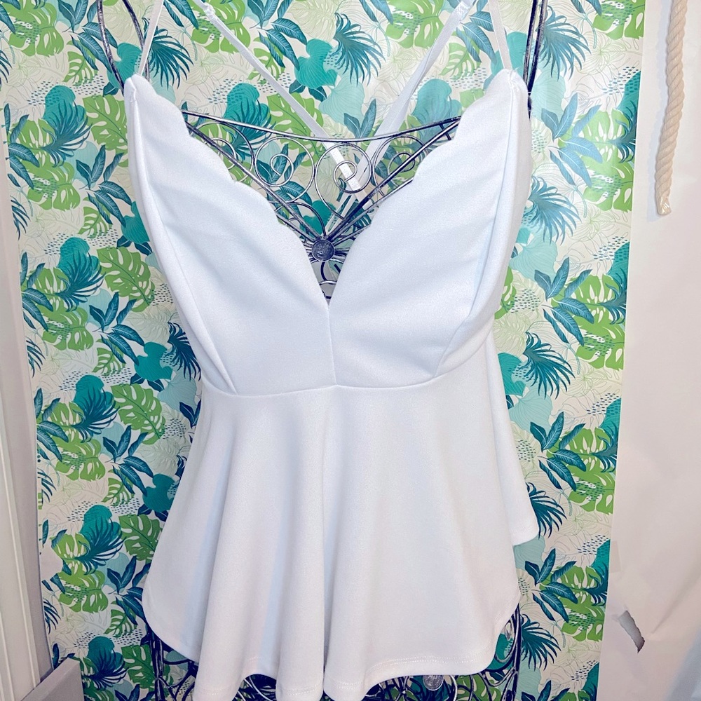 White scalloped summer top.